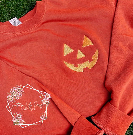 Embroidered Pumpkin Face Sweatshirt – Fall & Halloween Cozy Style