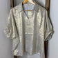Jodifl Metallic Oversized V-Neck Short Sleeve Top in Gold