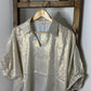 Jodifl Metallic Oversized V-Neck Short Sleeve Top in Gold