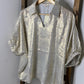 Jodifl Metallic Oversized V-Neck Short Sleeve Top in Gold